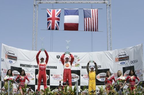 Het podium na de race in Monterrey: Justin Wilson, Sebastien Bourdais en AJ Allmendinger